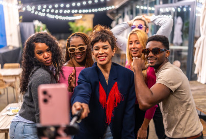 friends taking selfie while celebrating a party ou 2025 07 13 08 01 14 utc