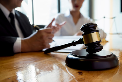 judge gavel with justice lawyers having team meeti 2025 01 29 08 01 30 utc